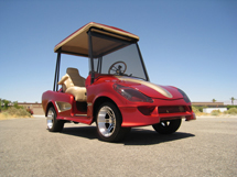 red and white sporty golf car