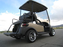 beige golf car rear